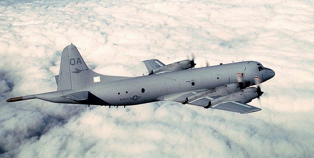 A P-3 Orion flies over Japan. (US Navy photo)