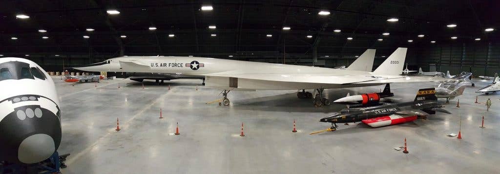 This photo of the XB-70 gives another glimpse of its immense size when compared to the X-15, the fastest manned aircraft that ever took to the skies. (USAF photo)
