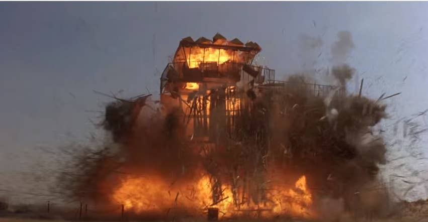 A tower goes up during the attack on Il Kareem in Iron Eagle. (Youtube screenshot)