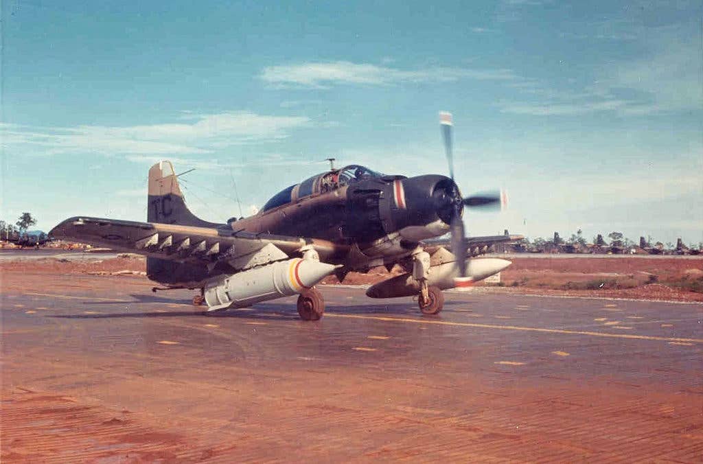 An Air Force A-1E Skyraider loaded with a fuel-air explosive bomb. (U.S. Air Force photo)