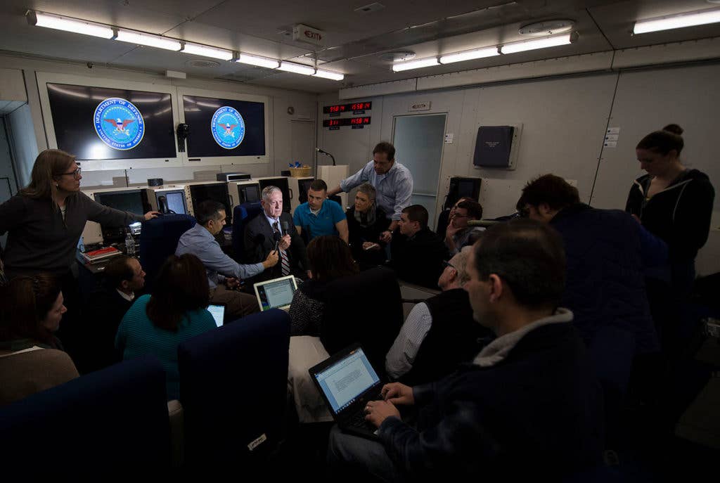 SECDEF James Mattis briefs members of the press aboard an E-4B (USAF photo)