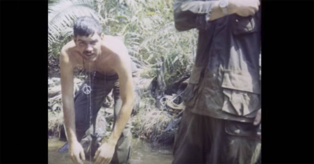 Tom Schober cooling himself down in a Vietnamese river (Source: Wisconsin Public Television/YouTube/Screenshot)