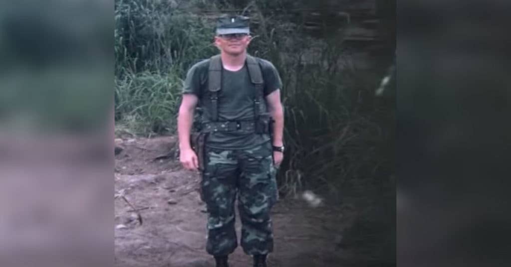 Dan takes a brief moment for a photo op while serving in the Vietnam jungle. (Source: Iowa Public Television/YouTube/Screenshot)