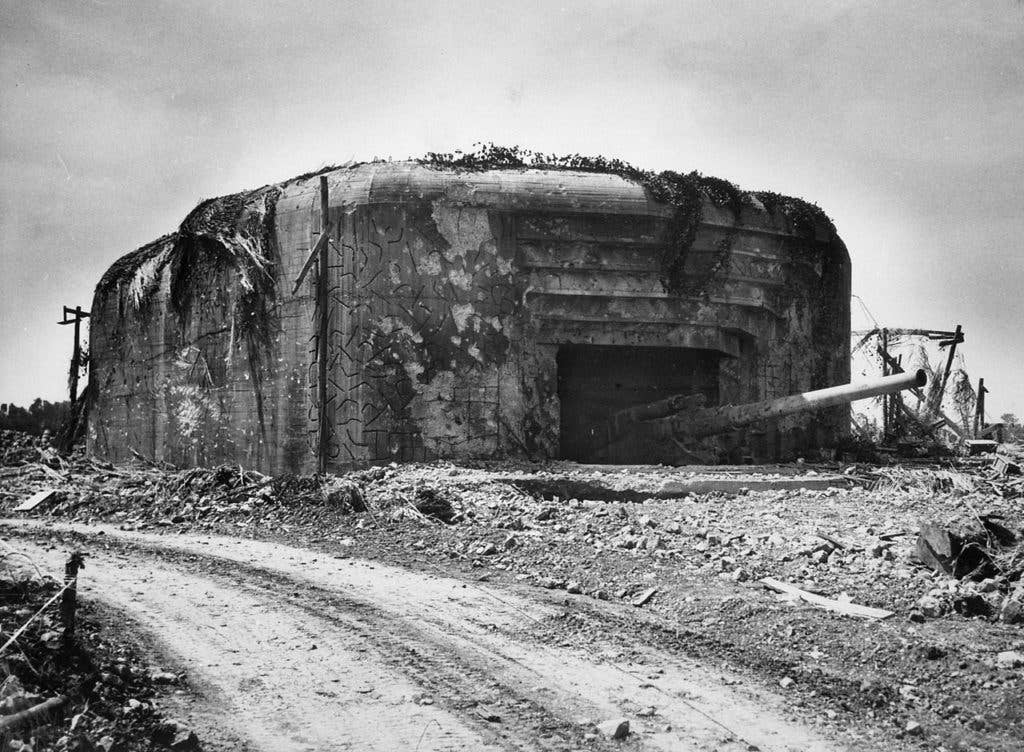 One on the 210mm gun of the German Crisbecq Battery in Normandy, not far away from Utah Beach. (U.S. Army photo)
