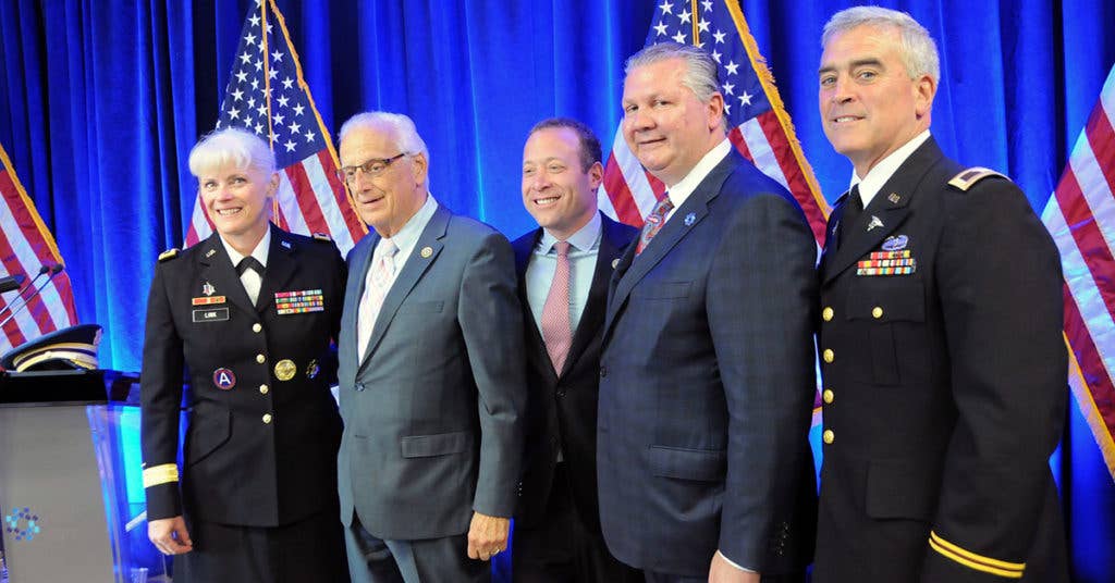 Maj. Gen. Mary Link, commanding general for Army Reserve Medical Command, stands next to Congressman Bill Pascrell from New Jersey's 9th district; Congressman Josh Gottheimer, from New Jersey's 5th district; Dr. Ihor Sawczuk, Hackensack University Medical Center President; and Col. Brad Wenstrup (far right), commander of 7457th Medical Backfill Bn. (U.S. Army photo)