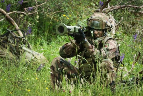 A French paratrooper aims his antitank weapon at an enemy. (U.S. Army photo by Sgt. Juan F. Jimenez)