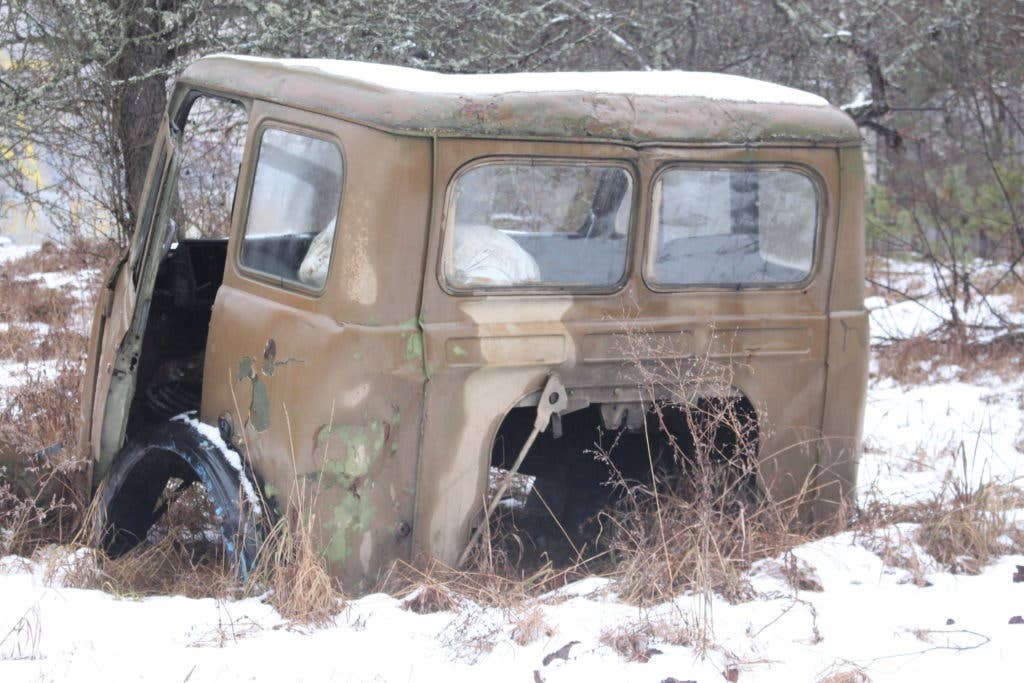 An abandoned vehicle near Pripyat, Ukraine