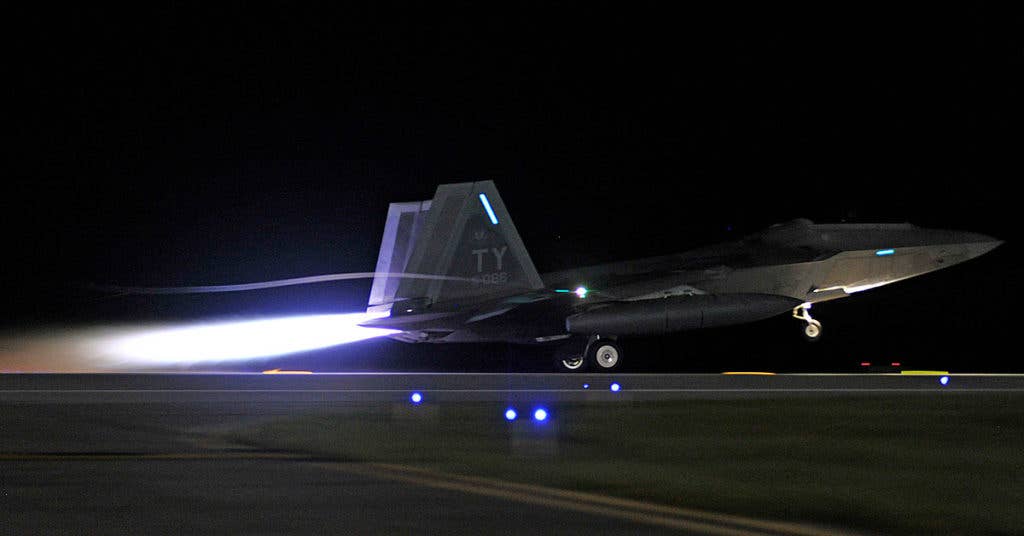 Afterburners lit while an F-22 of the 95th Fighter Squadron takes off. (Photo: U.S. Air Force)