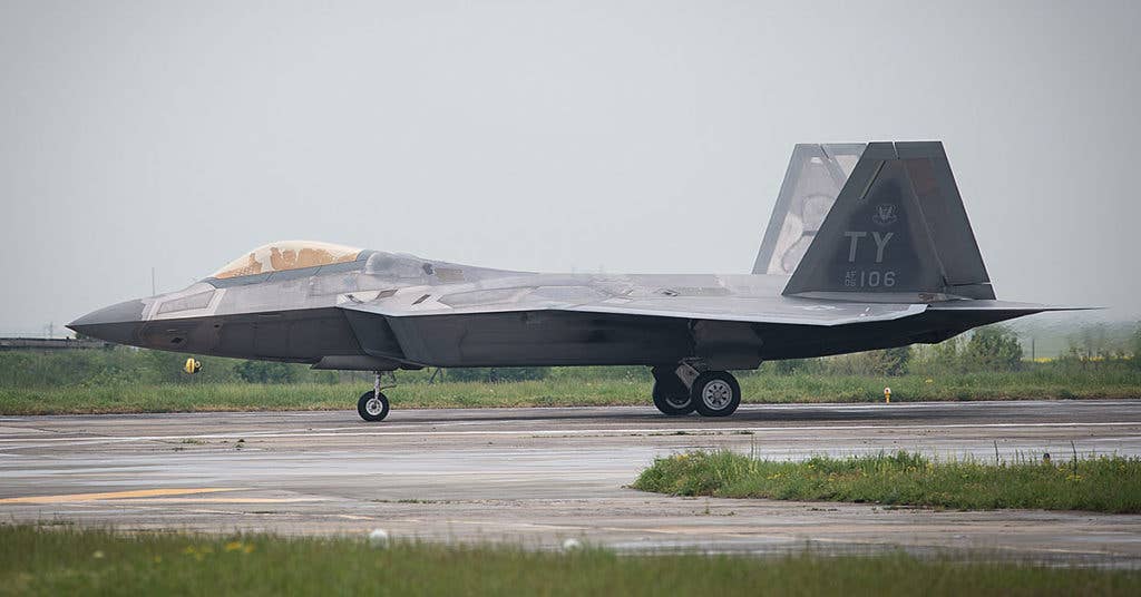 An F-22 Raptor on the flightline at Mihail Kogalniceanu Air Base in Romania, last year (Photo from USAF)