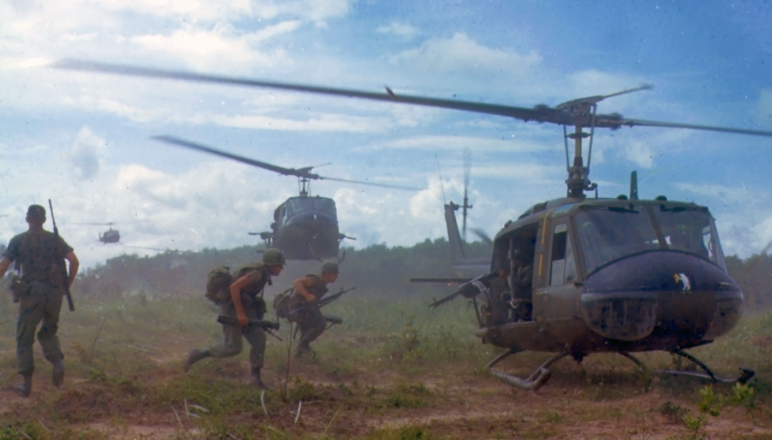 Troops from 2nd Battalion, 14th Infantry Regiment load up onto a Huey in Vietnam, 1966.