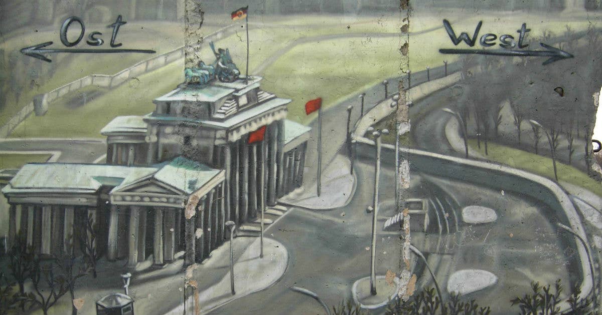 Street art depicting the Brandenburg Gate during the Cold War. Photo from Wikimedia Commons.