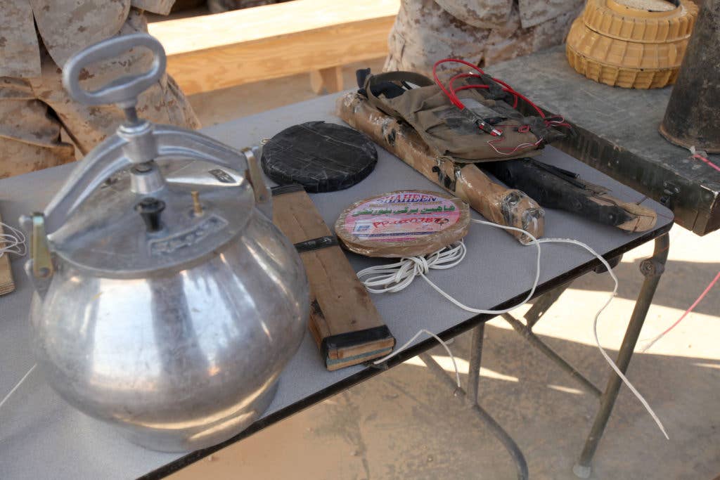 Pressure cookers, homemade pressure plates, and other conventional materials are used by enemy forces to make improvised explosive devices. (Source: Marines.mil)