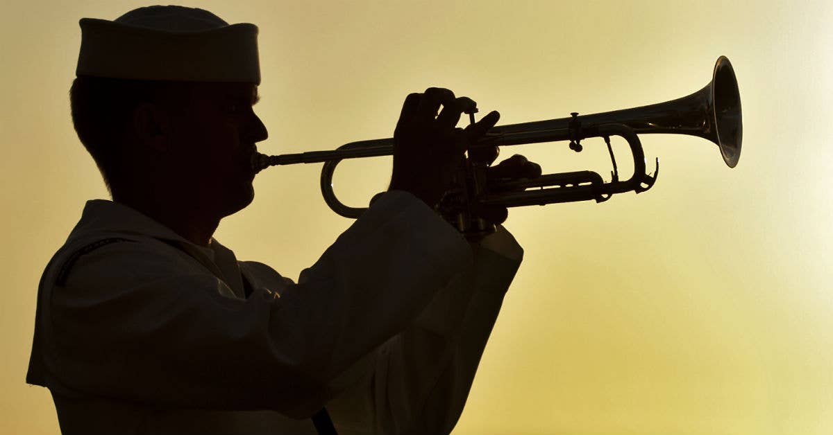 Why this Navy officer is threatening a lawsuit over playing taps
