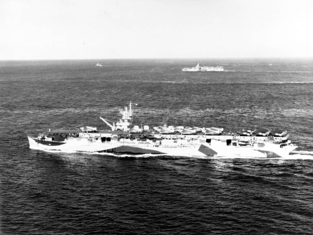 USS Cowpens (CVL 25) with aircraft on the flight deck. (U.S. Navy photo)