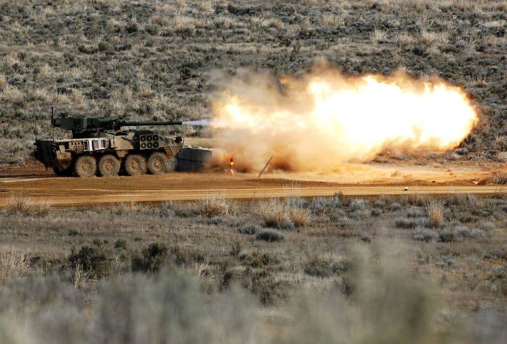 Armor Soldiers assigned to 3rd Stryker Brigade Combat Team, 2nd Infantry Division, fire their Main Gun Systems (MGS) Stryker's 105 mm main gun during a live fire range 28 March 2011, at Yakima Training Center, Wash. (US Army photo)