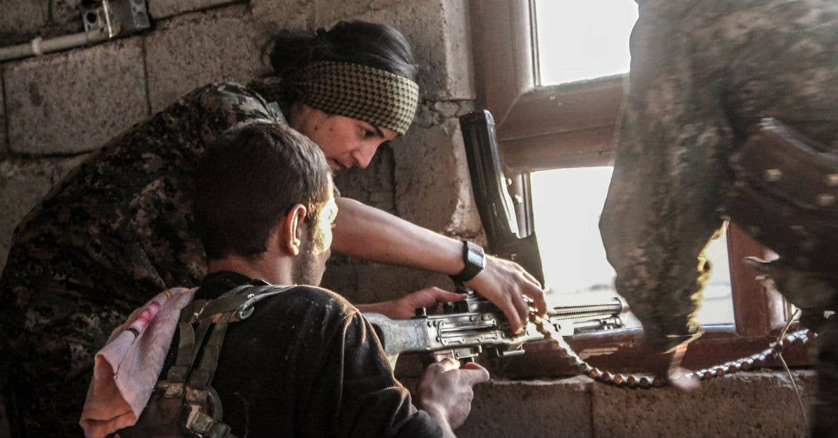 YPJ and YPG forces work together. Photo from Kurdishstruggle on Flickr.