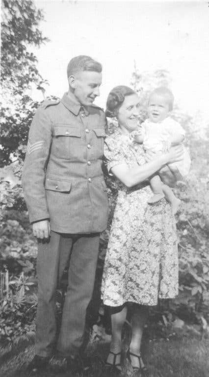 Frank Paddy Ryan in uniform with his wife Molly and son David taken in 1942. (via Birmingham Mail)