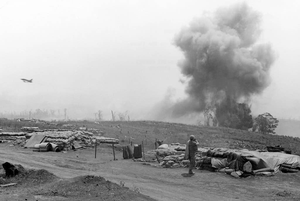 F-100 strikes close to the lines, Khe Sanh, Vietnam, on March 15, 1968. (Photo: U.S. Marine Corps Moore)