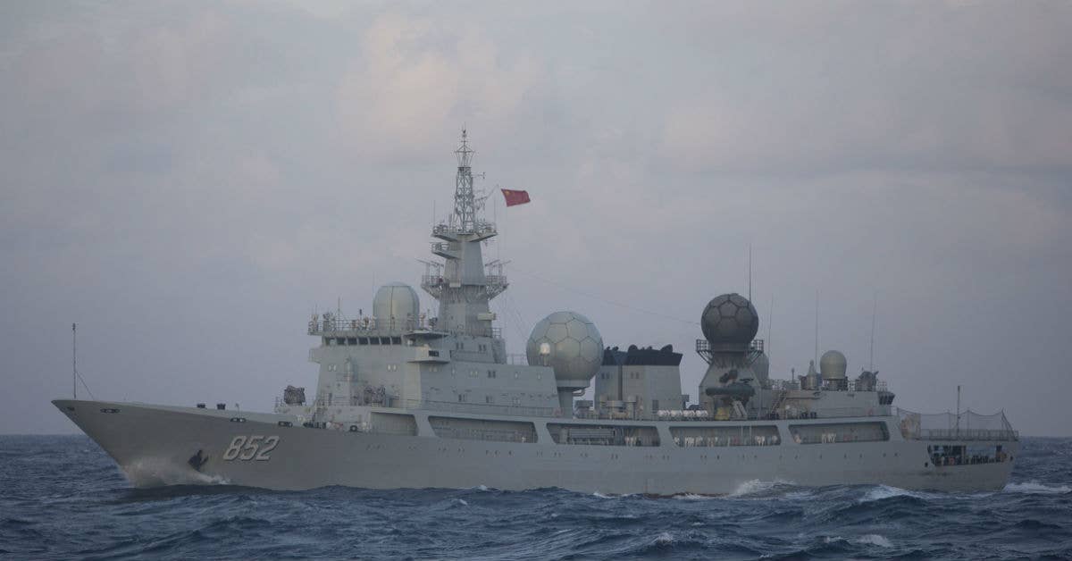 China's Type 815 Dongdiao-class auxiliary general intelligence vessel ship. Photo from Commonwealth of Australia.