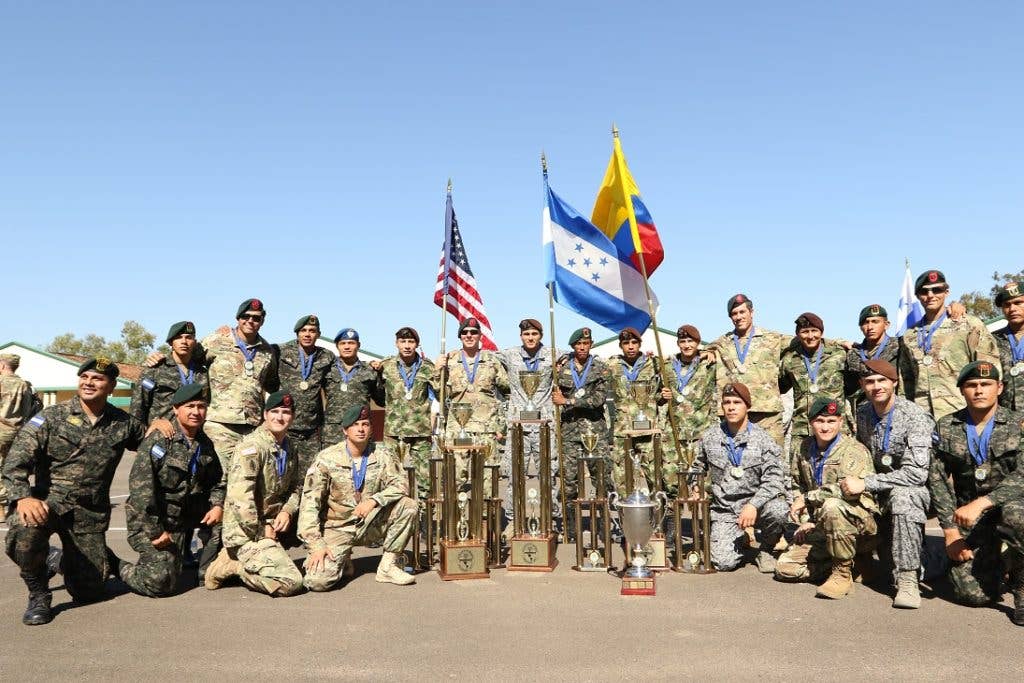 Honduran, Colombian, and U.S. Soldiers commemorate a successful Fuerzas Comando on July 27, 2017, in Mariano Roque Alonso, Paraguay. (U.S. Army photo by Sgt. Joanna Bradshaw)