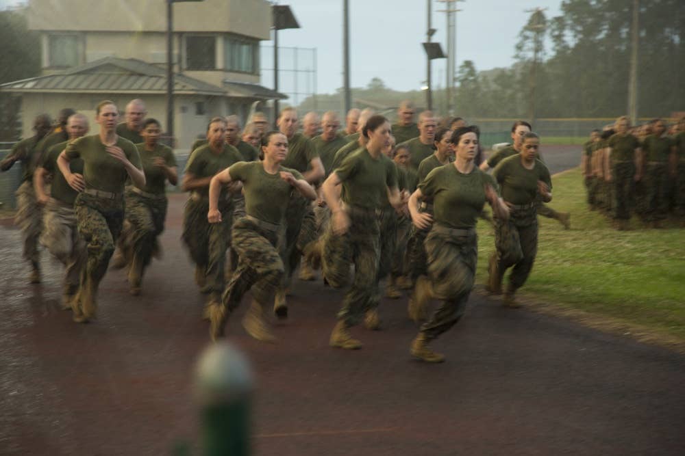 US Marine Corps recruits run 800 meters during an initial Combat Fitness Test on Marine Corps Recruit Depot Parris Island, S.C., May 13, 2017. US Marine Corps photo by Chief Warrant Officer 2 Pete Thibodeau