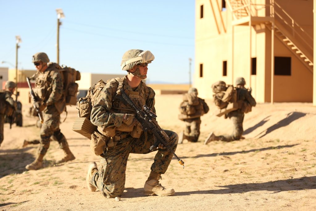2nd Lt. Anthony Pandolfi, student, Infantry Officers Course 2-15, posts security after entering Range 220 during exercise Talon Reach V aboard the Combat Center, March 25, 2015. (Official Marine Corps photo by Lance Cpl. Thomas Mudd/Released)