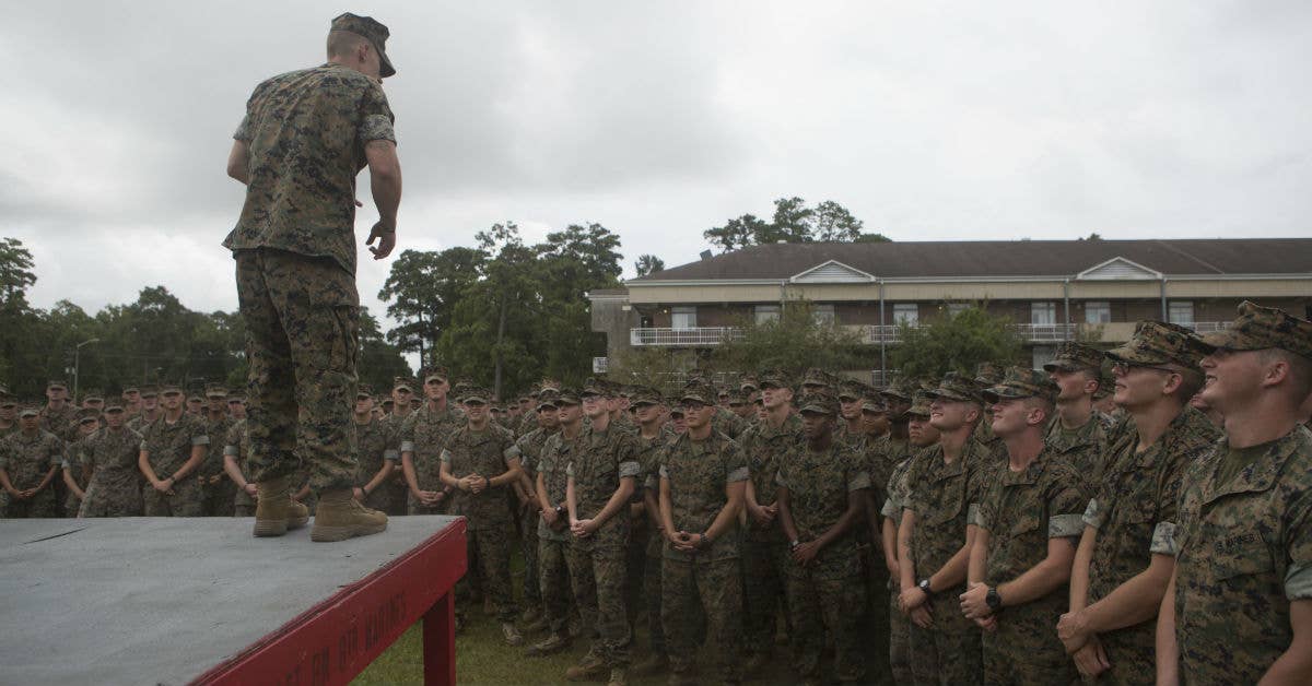 Sgt. Kevin Peach delivers the battalion safety brief after being awarded a Navy and Marine Corps Medal during a battalion formation at Camp Lejeune, N.C., Aug. 8, 2017. USMC photo by Sgt. Brandon Thomas.