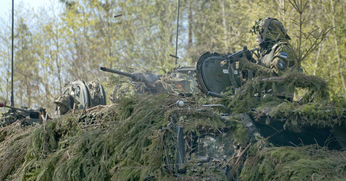 Soldiers with the Estonian Defense Force defend their position May 12, during Operation Siil in Oandu, Estonia. Army photo by Sgt. Juana Nesbitt.