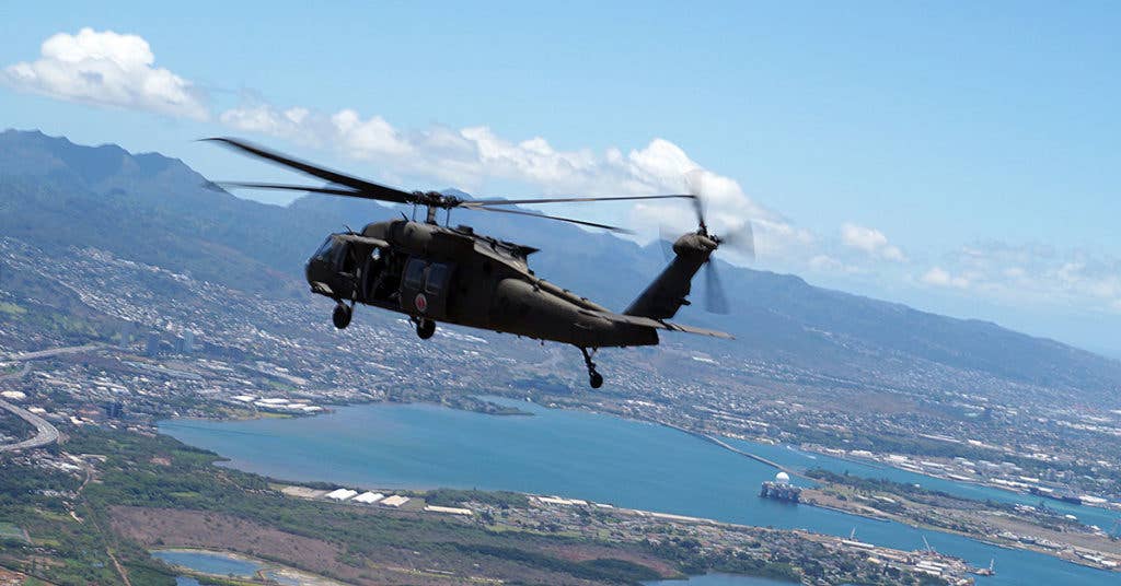 Company C, 1st Battalion, 207th Aviation Regiment (1-207th Aviation) conducts an air assault mission out of Wheeler Army Air Field (WAAF) in Wahiawa, Hawaii. (U.S. Army National Guard photo by Spc. Lisa K. Lariscy/Released)