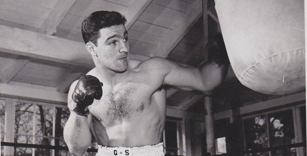 Marciano punching the heavy bag.
