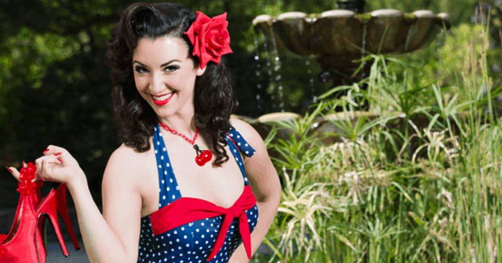 Gina Elise on the cover of the 2015 Pin-Ups for Vets Calendar.