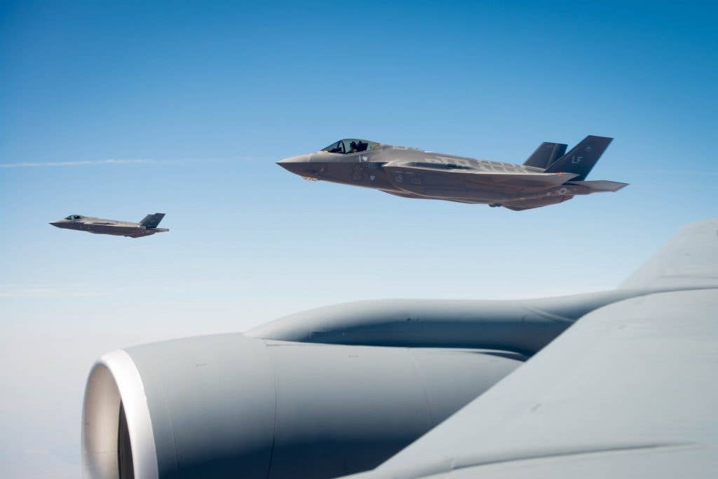 Four F-35's participated in a missing man formation fly-over during 2nd Lt. Charles E. Carlson's funeral in Pennsylvania more than 70 years after being shot down over Germany in World War II when he was assigned to the 62nd FS. (U.S. Air Force photo/Staff Sgt. Jensen Stidham)