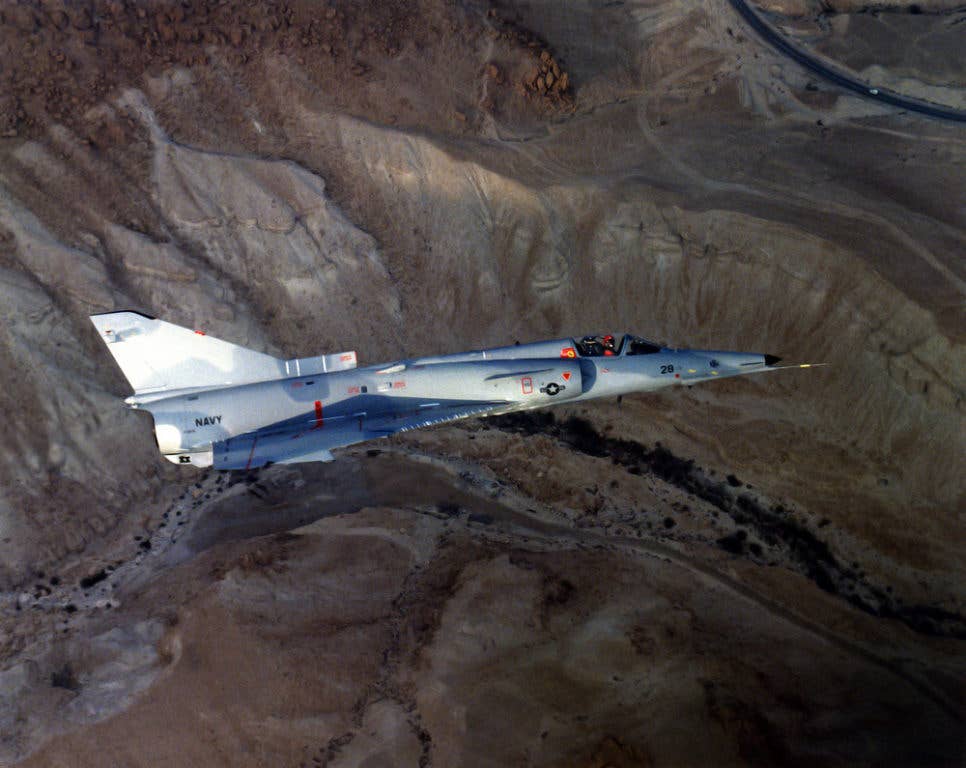 An air-to-air right side view of an F-21A Kfir (young lion) aircraft. The Israeli-built delta-wing tactical fighter was used as part of the Navy's aggressor training. (US Navy photo)