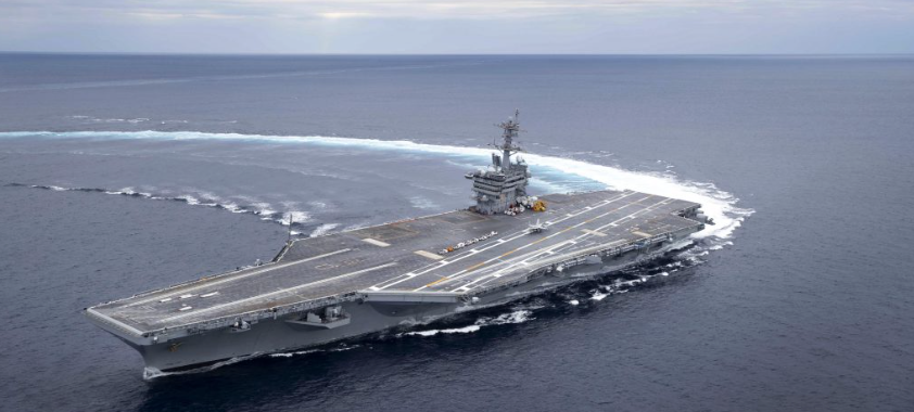 The Nimitz-class aircraft carrier USS Abraham Lincoln (CVN 72) busting a U-turn in the Atlantic Ocean. (Image from Wikipedia Commons)