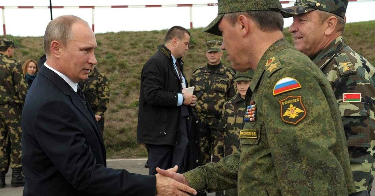 Putin meets with Chief of the General Staff of Russia's Armed Forces and First Deputy Defence Minister Valery Gerasimov and Belarusian Defence Minister Yury Zhadobin, 2013. Photo from Russian Kremlin.