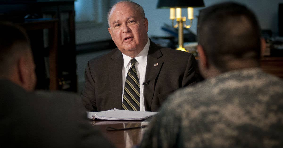 Under Secretary of the Army Joseph Westphal, center, discusses business transformation and best practices with representatives. Army photo by Staff Sgt. Bernardo Fuller.