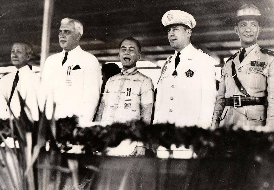 Left to Right - Vice-President Sergio Osmena, Paul V. McNutt, U.S. High Commissioner, President Manuel Quezon, Field Marshal Douglas MacArthur, General Paulino Santos, Chief of Staff of the Philippine Army.