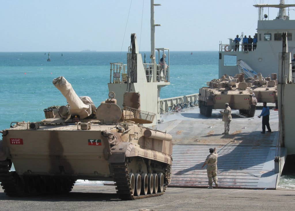 The United Arab Emirates, a GCC member, offloads a BMP-3 infantry fighting vehicle at a Kuwaiti port facility from its Elbahia L62 landing craft. (U.S. Navy photo by Journalist 1st Class Joseph Krypel).