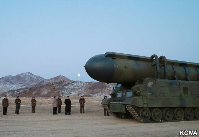 A surface-to-surface mediu long range ballistic missile is transported for launch in North Korea. (KCNA)