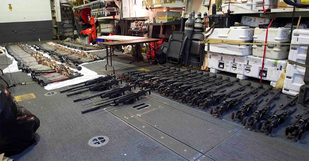 A cache of weapons seized from a stateless dhow which was intercepted on March 28, 2016. The United States assessed that the cache originated in Iran and was likely bound for Houthi insurgents in Yemen. US Navy photo by Mass Communication Specialist 2nd Class Darby C. Dillon.