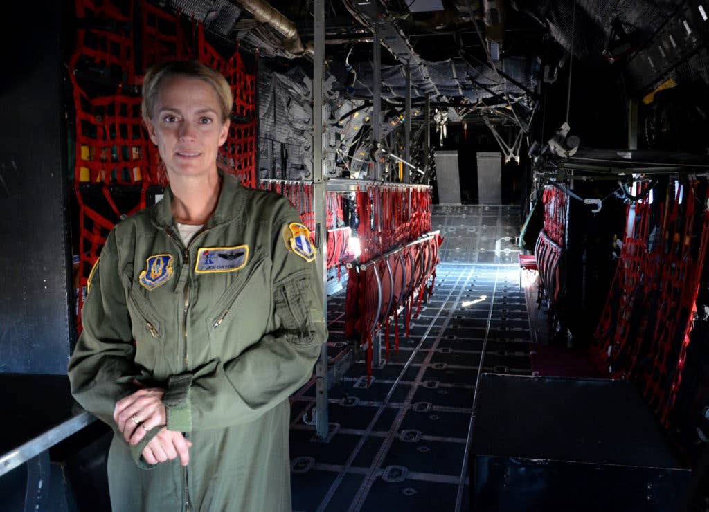 Maj. Jennifer Orton, a combat search and rescue (CSAR) pilot with the 39th Rescue Squadron here, flies the HC-130P/N King fixed-wing aerial refueling aircraft on missions for the 920th Rescue Wing. Orton recently discovered that according to the 39th RSQ she holds the title of being their first female Air Force Reserve fixed-wing CSAR pilot. (U.S. Photo by Senior Airman Brandon Kalloo Sanes)