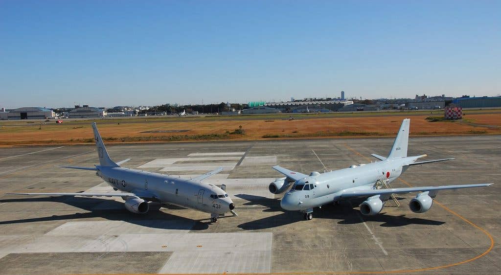 A P-8 Poseidon (left) and the P-1 (right). (US Navy photo)