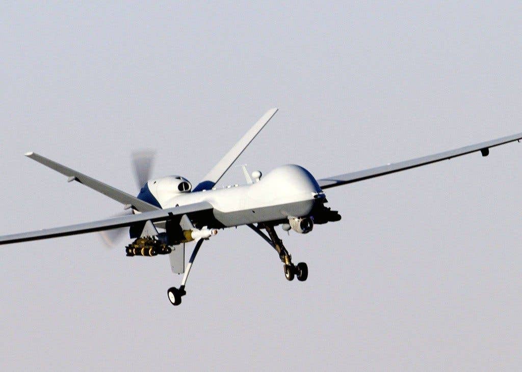 A MQ-9 Reaper unmanned aerial vehicle prepares to land after a mission in support of Operation Enduring Freedom in Afghanistan. The Reaper has the ability to carry both precision-guided bombs and air-to-ground missiles. (U.S. Air Force photo/Staff Sgt. Brian Ferguson)
