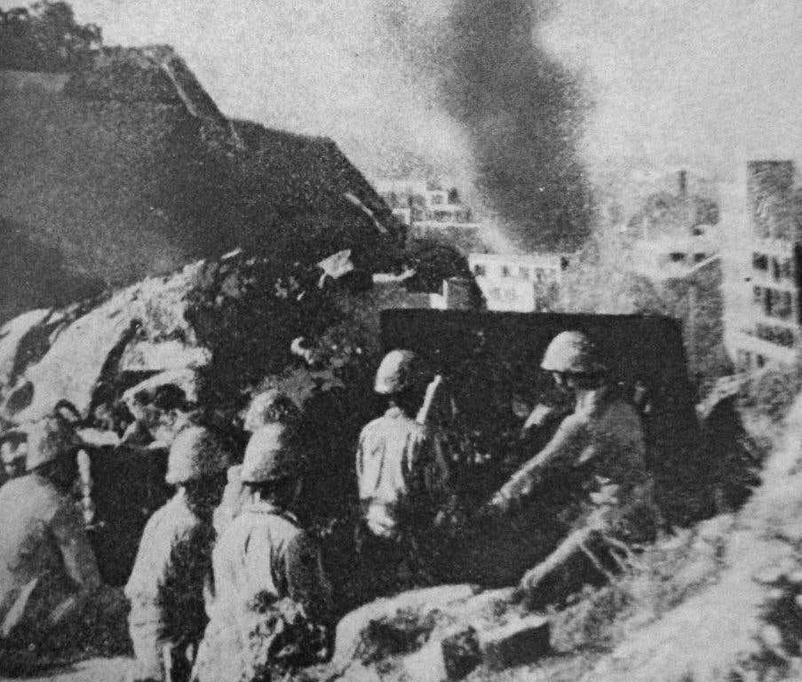Japanese fire artillery at the British colony of Hong Kong. (Photo: Veterans of Foreign Wars)