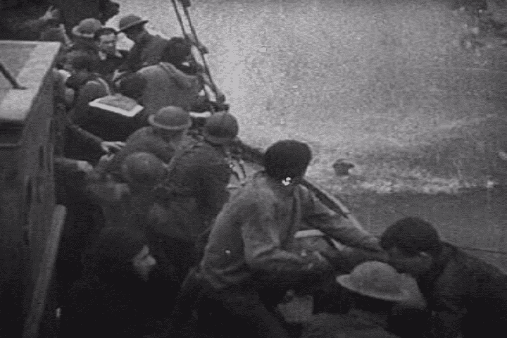 The crew of a fishing boat retrieves British troops off Dunkirk. (US Army image)