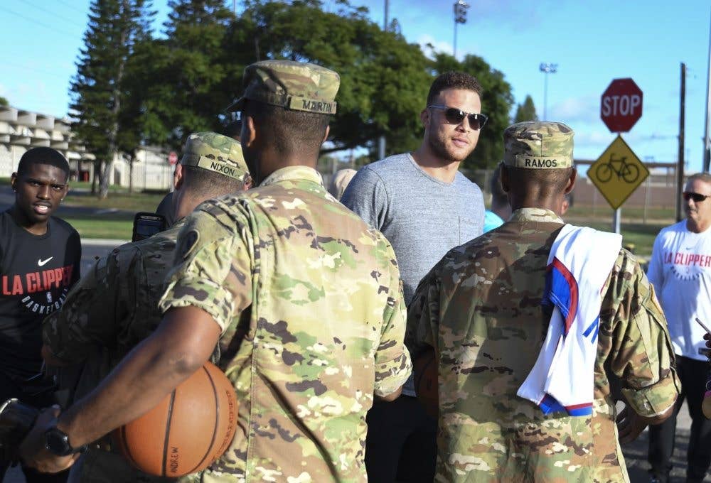 LA Clippers' Power Forward, Blake Griffin, greeted by soldiers. (Photo by Petty Officer 1st Class Meranda Keller)