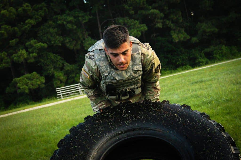 Sgt. Jared Bruce, a combat engineer from the 36th Engineer Brigade, flips a tire as part of the Soldier Readiness Test during the 2017 Forces Command Best Warrior Competition at Fort Bragg, N.C., Aug. 20. | U.S. Army photo by Spc. Hubert D. Delany III