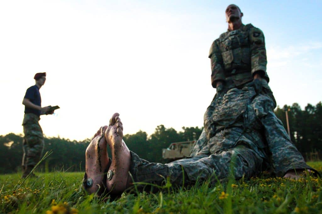 Sgt. Michael Smith, a multichannel transmission systems operator from the 58th Signal Company, 101st Airborne Division (Air Assault), drags a simulated casualty as part of the Soldier Readiness Test during the 2017 Forces Command Best Warrior Competition at Fort Bragg, N.C., Aug. 20 | U.S. Army photo by Spc. Hubert D. Delany III