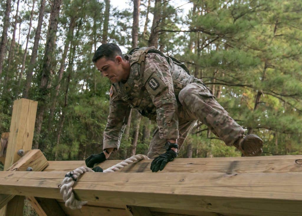 Cpl. Mark Combs, an explosive ordnance disposal specialist from 52nd Ordnance Group, participates in the obstacle avoidance challenge as part of the Soldier Readiness Test during the 2017 Forces Command Best Warrior Competition at Fort Bragg, N.C., Aug. 20. | U.S. Army photo by Spc Liem Huynh