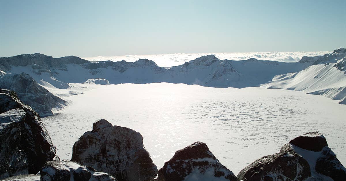Heaven Lake in the caldera atop Mt. Paektu. Wikimedia Commons photo from user Farm.